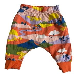 Next Level Apparel Orange and Pink Joggers with Artistic Design